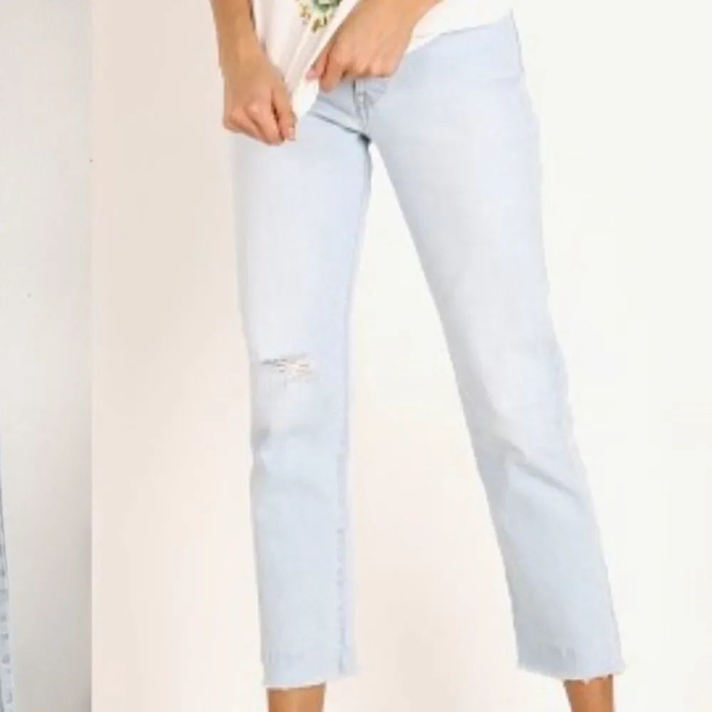 Levi’s Premium 501 High Rise button fly Raw Hem light wash distressed Jeans 27